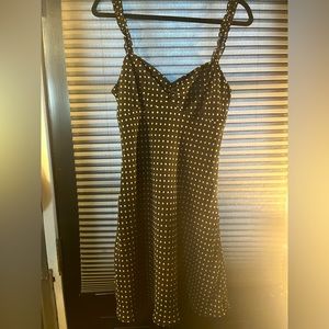 Urban outfitters polka-dot black mini dress, small ruffles, size medium.